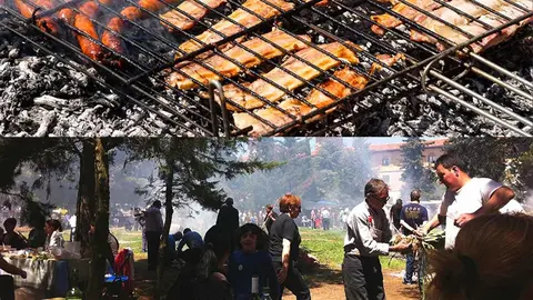 Asado de alimentos sobre brasas de sarmientos en la huerta del Villar de Corella
