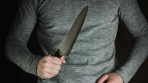 Agresor Machete foto de archivo